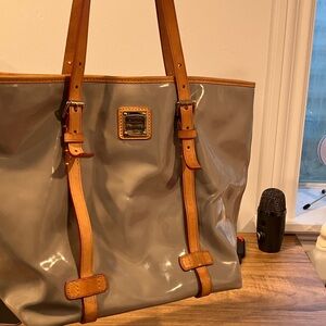 Dooney and Bourke grey patent leather tote.